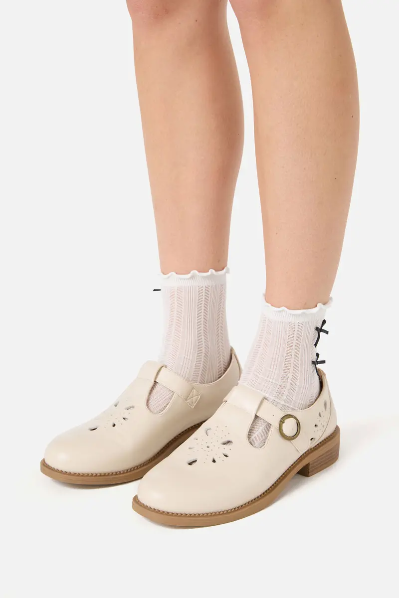 Cream Cut Out Shoe 1